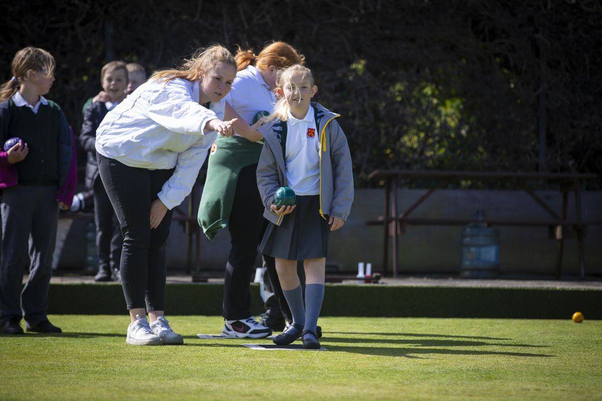 GBC's Sophie Rabey was a key figure in coaching bowls to youngsters from Amherst School this summer. (Picture By Peter Frankland, 30180096)