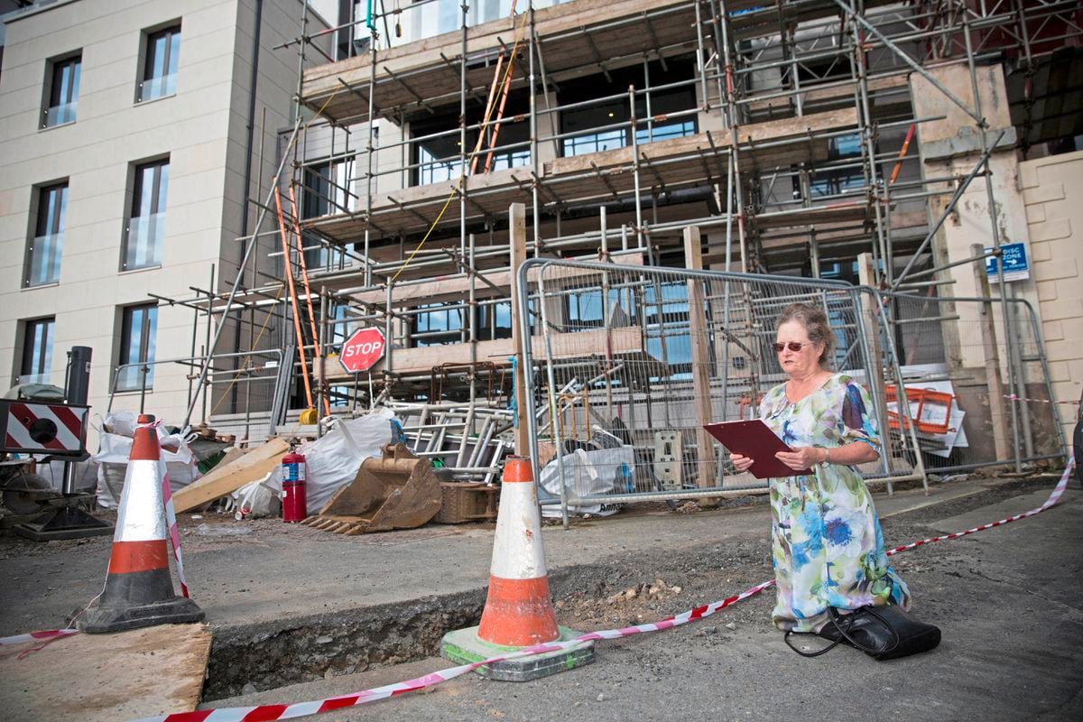 Picture By Peter Frankland. 14-08-18 Rosie Henderson performes the clameur de haro in protest against the changes to the pavement area outside the former brewery at Havelet. Guernsey Brewery.. (22264755)