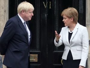 Prime Minister Boris Johnson with Nicola Sturgeon, First Minister of Scotland, which counts Covid-related deaths differently to England. (28568484)