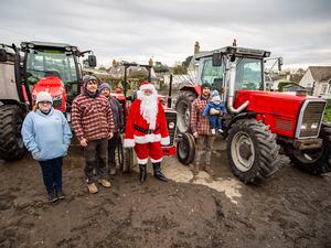 Left to right: Mia Spruce, Ben Le Page, Matthew Spruce, Santa Claus, Peter Reddall and 10-month-old Callum Reddall. (Picture by Sophie Rabey, 31566117)