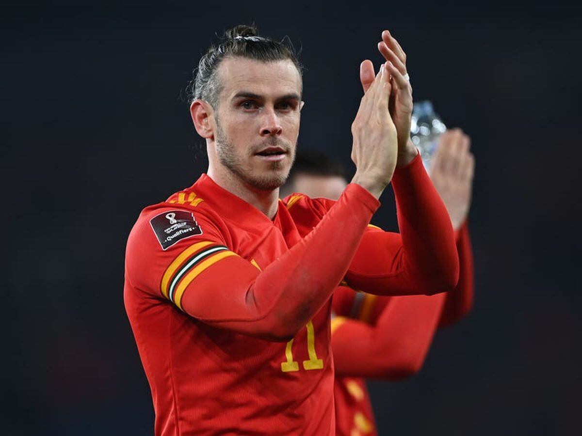 Wales fans wearing Gareth Bale shirts outside the ground before