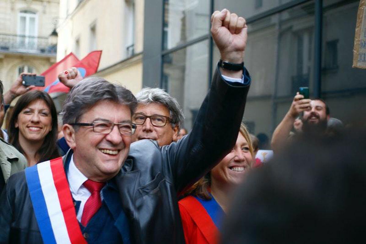 Far-left leader holds rally against French president amid worker rights ...