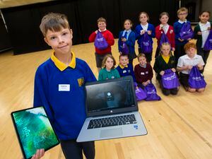 Picture By Peter Frankland. 16-05-23 Primary School digital leaders. Reps from each primary school (including Alderney) with their goddy bags from PWC. Front is Zachary Newstead, 9.. (32122345)