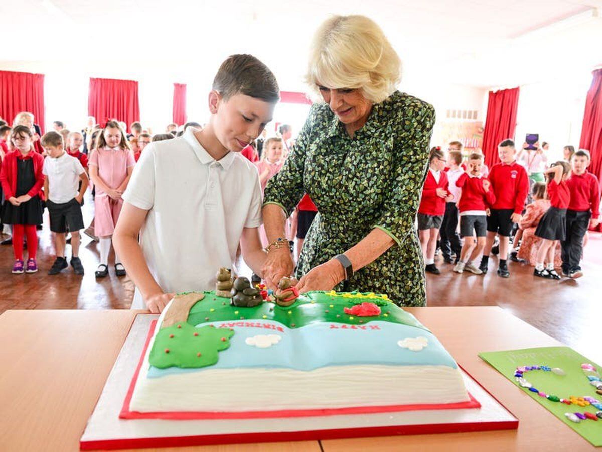 Pupils sing Happy Birthday to Camilla at opening of school library