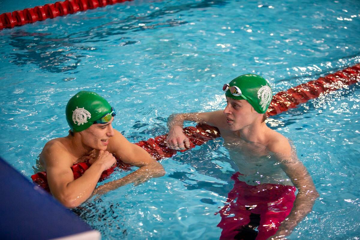 How was it for you?: Samuel Bourgaize (left) and Samuel Lowe discuss their 200m backstroke performances. (Picture by Sophie Rabey, 28961948)