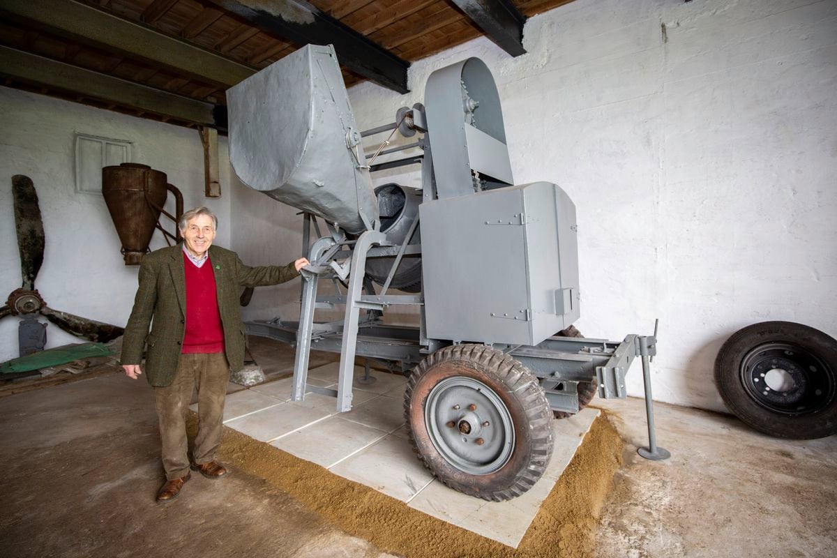 Richard Heaume alongside the restored mixer at the German Occupation Museum. Inset: the machine in use during the war. (Picture by Sophie Rabey, 30416591, 30424435)