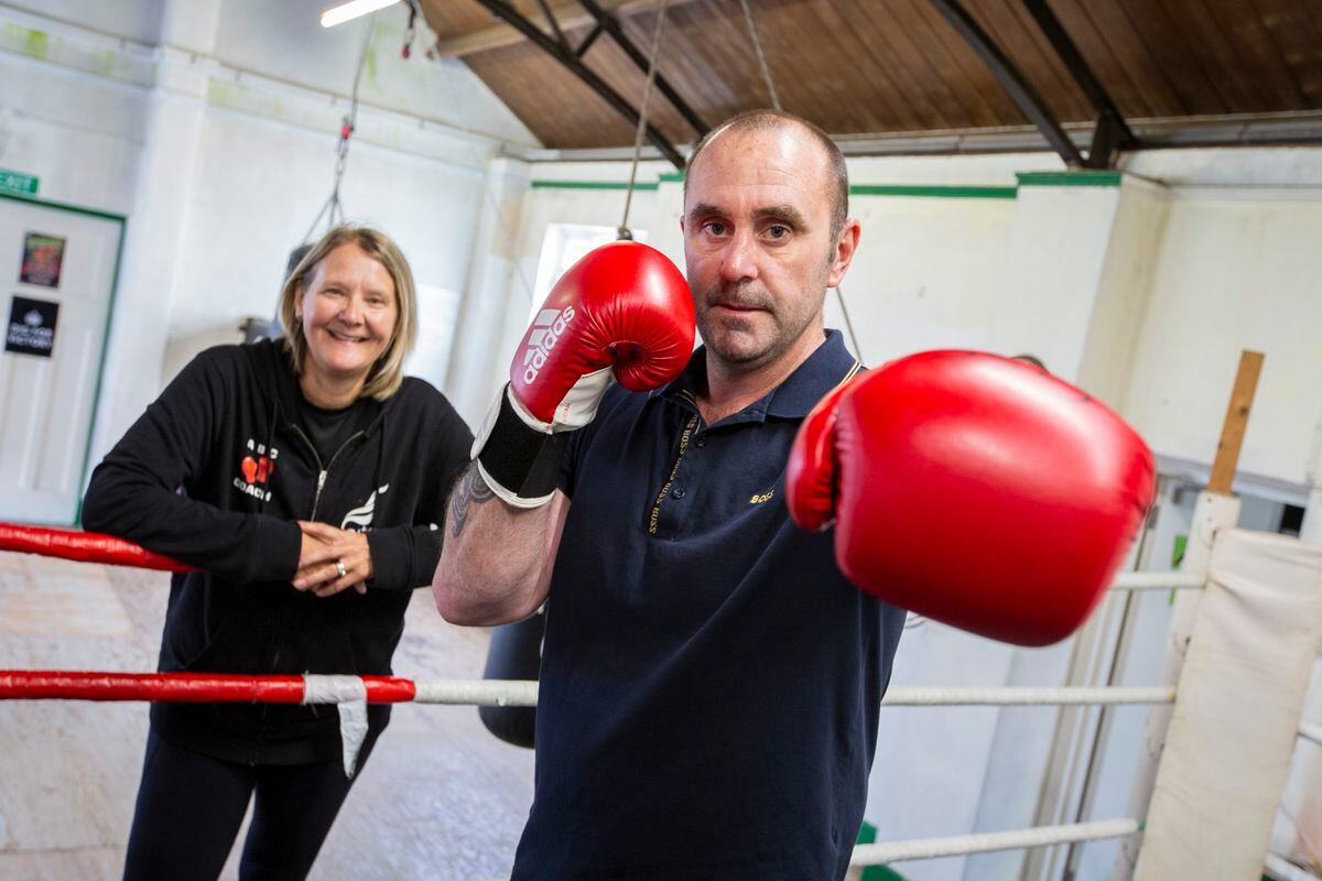 Steve Mourant has written a letter, in response to the ongoing dispute of the Sports Commission's funding, about how boxing helped his mental health. Left to right: Boxing development officer Mandy Hobart and Mr Mourant inside the Guernsey Amalgamated Boxing Club. (32181739)