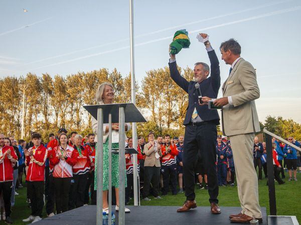 The flag is handed over from Dame Mary Perkins to Gordon Deans chair of Orkney IG organising committee with Jorgen Pettersson, right. (Pictures by Peter Frankland, 32327121)