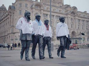 The Beatles Statue dressed in Ukrainian clothing ahead of Eurovision