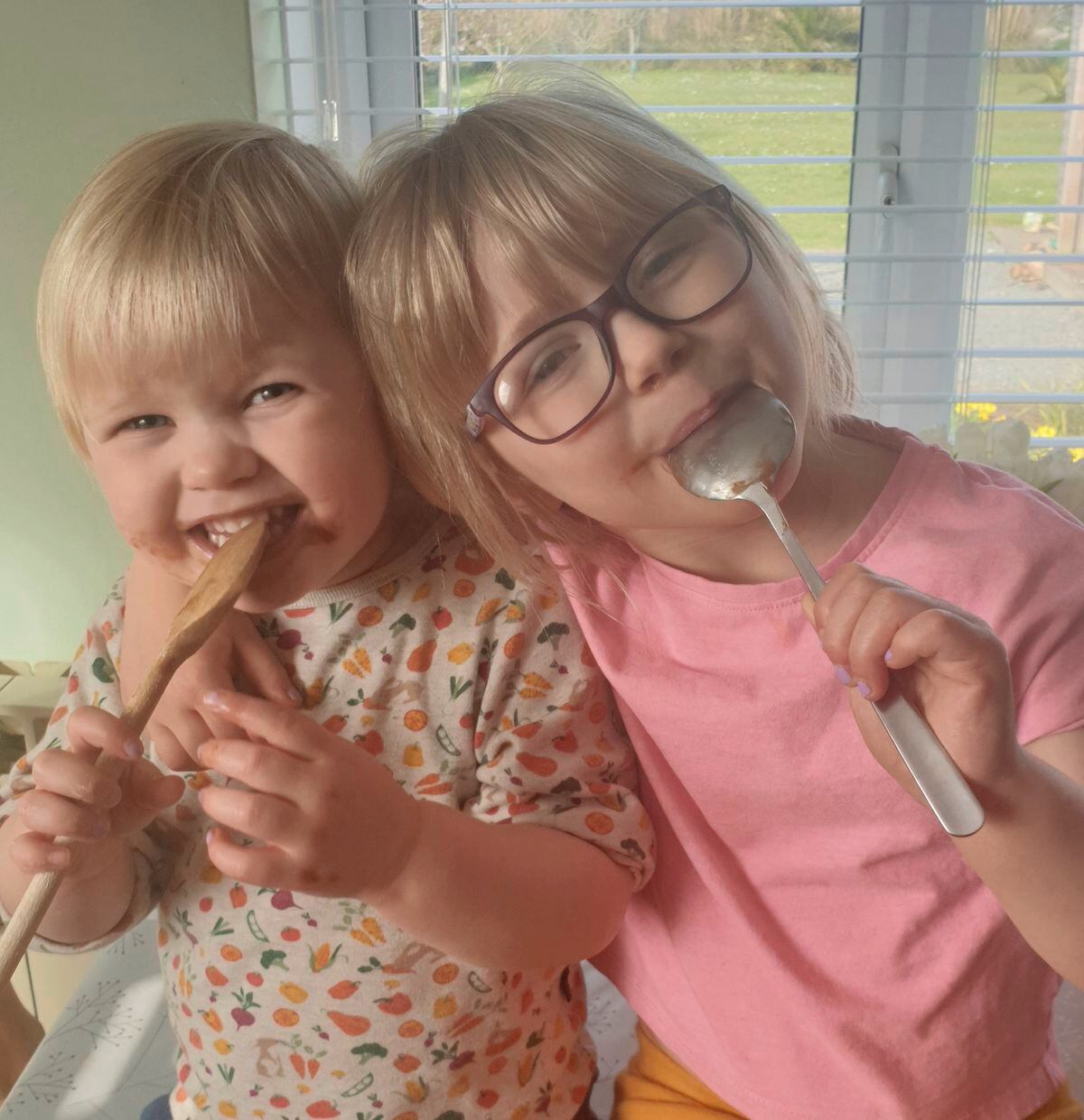 Bake Off winners Lila and Calla Cole, pictured licking the spoons while their brownies baked. (29304885)