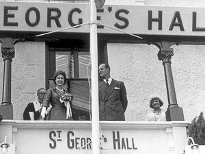 The Queen and Prince Phillip on the balcony of St George’s Hall during their visit in 1957. (31174134)