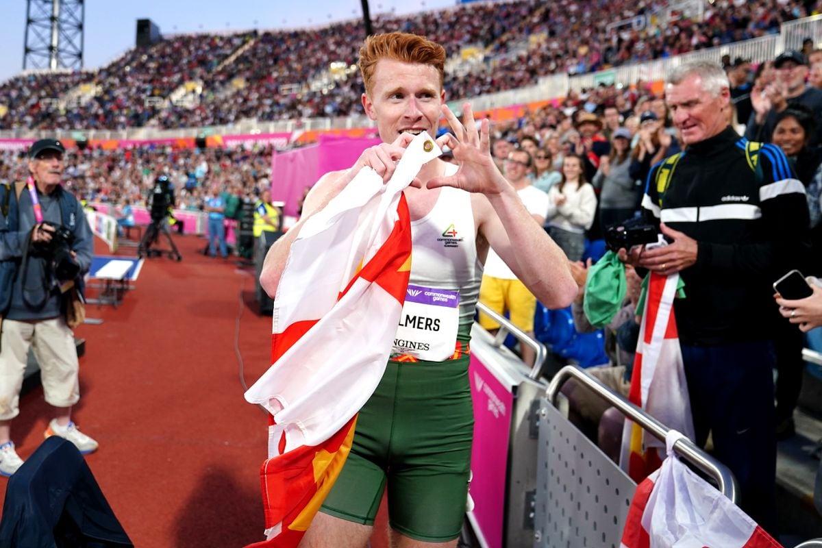 That's my boy: The emotion is obvious in the faces of both Alastair Chalmers and his father Chris, right, as the Guernsey athlete celebrates winning bronze in the men's 400m hurdles final at Alexander Stadium on Saturday. (Picture by PA, 31119692)