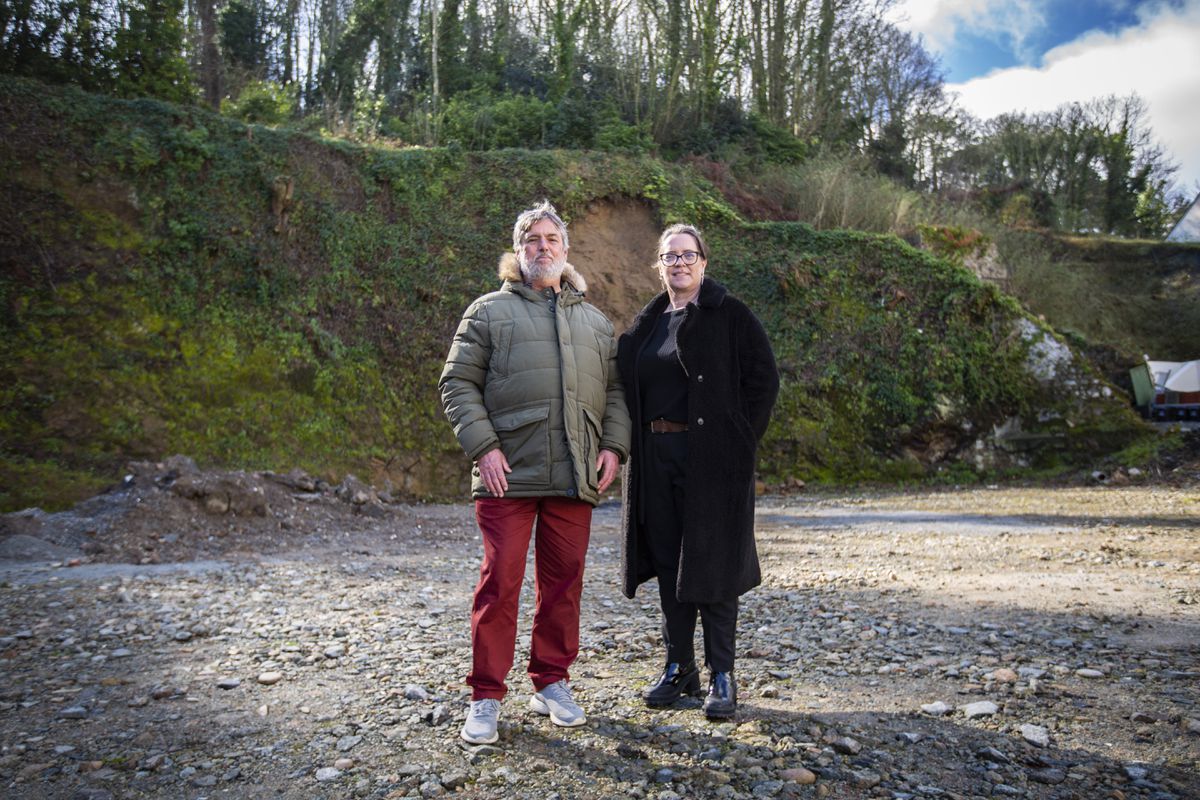 Employment & Social Security president Deputy Peter Roffey and GHA chief executive Vic Slade at the former CI Tyres site in La Charroterie, where the Guernsey Housing Association is proposing to build 54 one-bed flats, double the number of houses previously planned. (Picture by Sophie Rabey, 31917724)