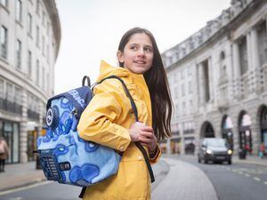 Girl inspired by asthmatic mother to create air filter backpack wins competition