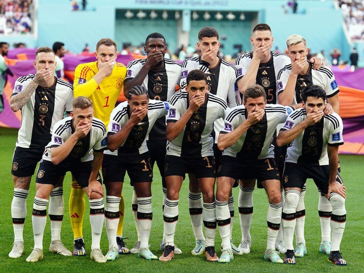 Germany players cover mouths for team photo in protest over OneLove armband ban
