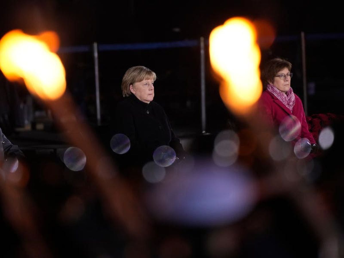 Angela Merkel urges Germans to shun hatred as she prepares to step down