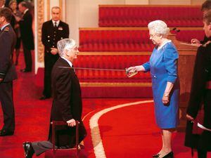 Picture Suplied. Sir Geoffrey Rowland is knighted by Queen Elizabeth II at Buckingham Palace 13th November 2009.. (31268024)
