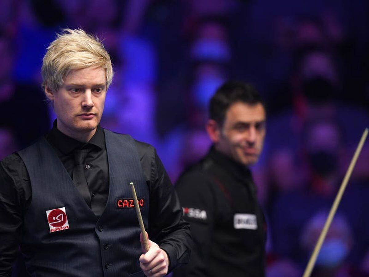 Neil Robertson gets the better of Ronnie O’Sullivan at the Masters