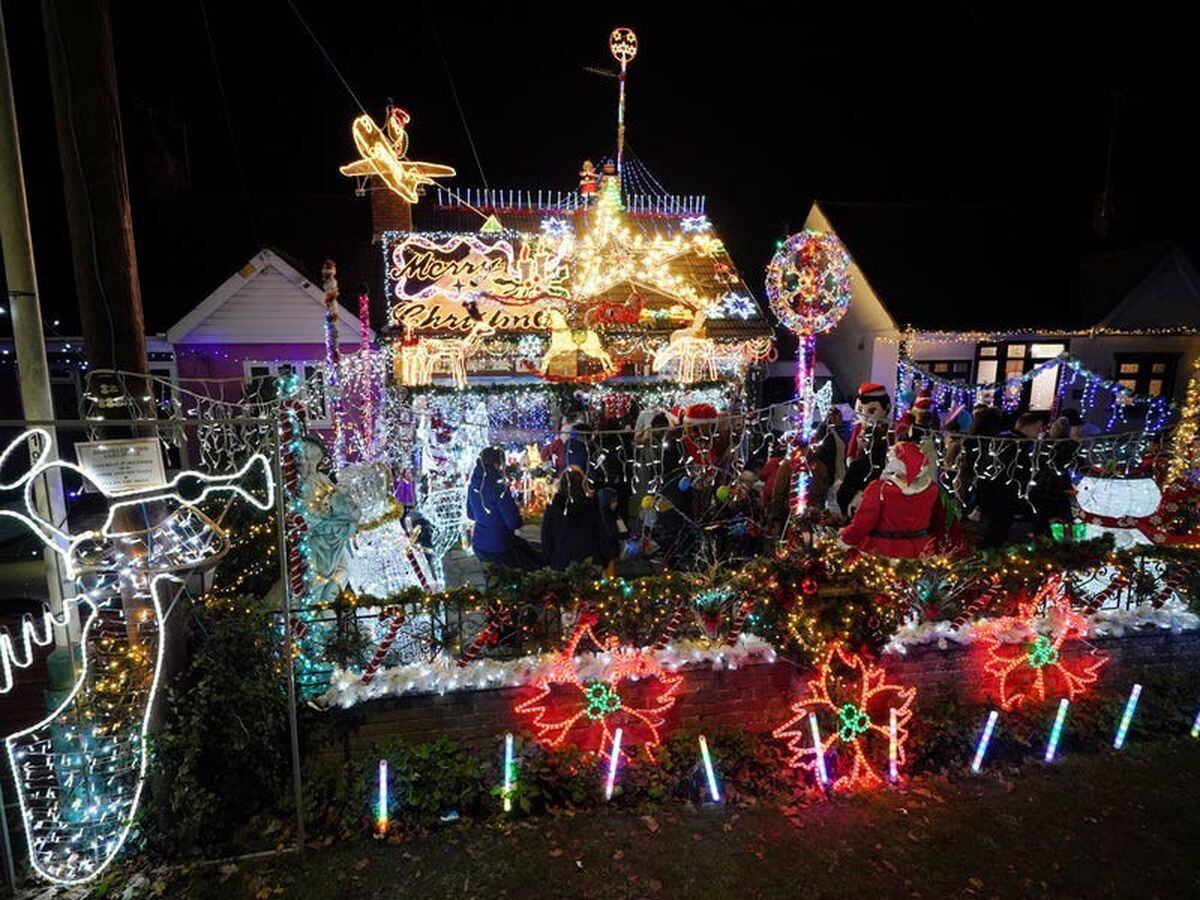 Couple use thousands of lights to create elaborate charitable Christmas display