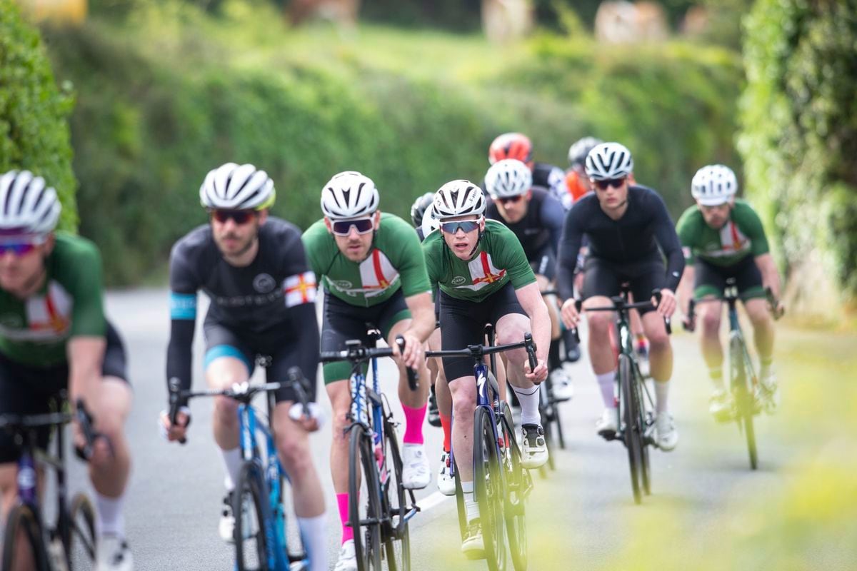 Josh Saunders, second from right in the black outfit, won his second race in the space of a week in the Liberation Day Road Race. (Picture by Peter Frankland, 29528007)