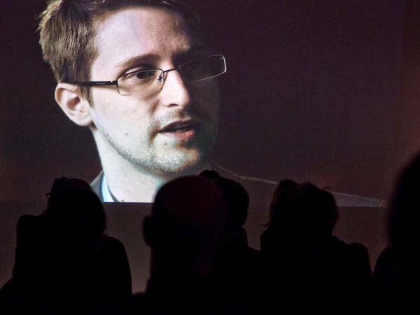 Vladimir Putin grants Russian citizenship to NSA whistleblower Edward Snowden