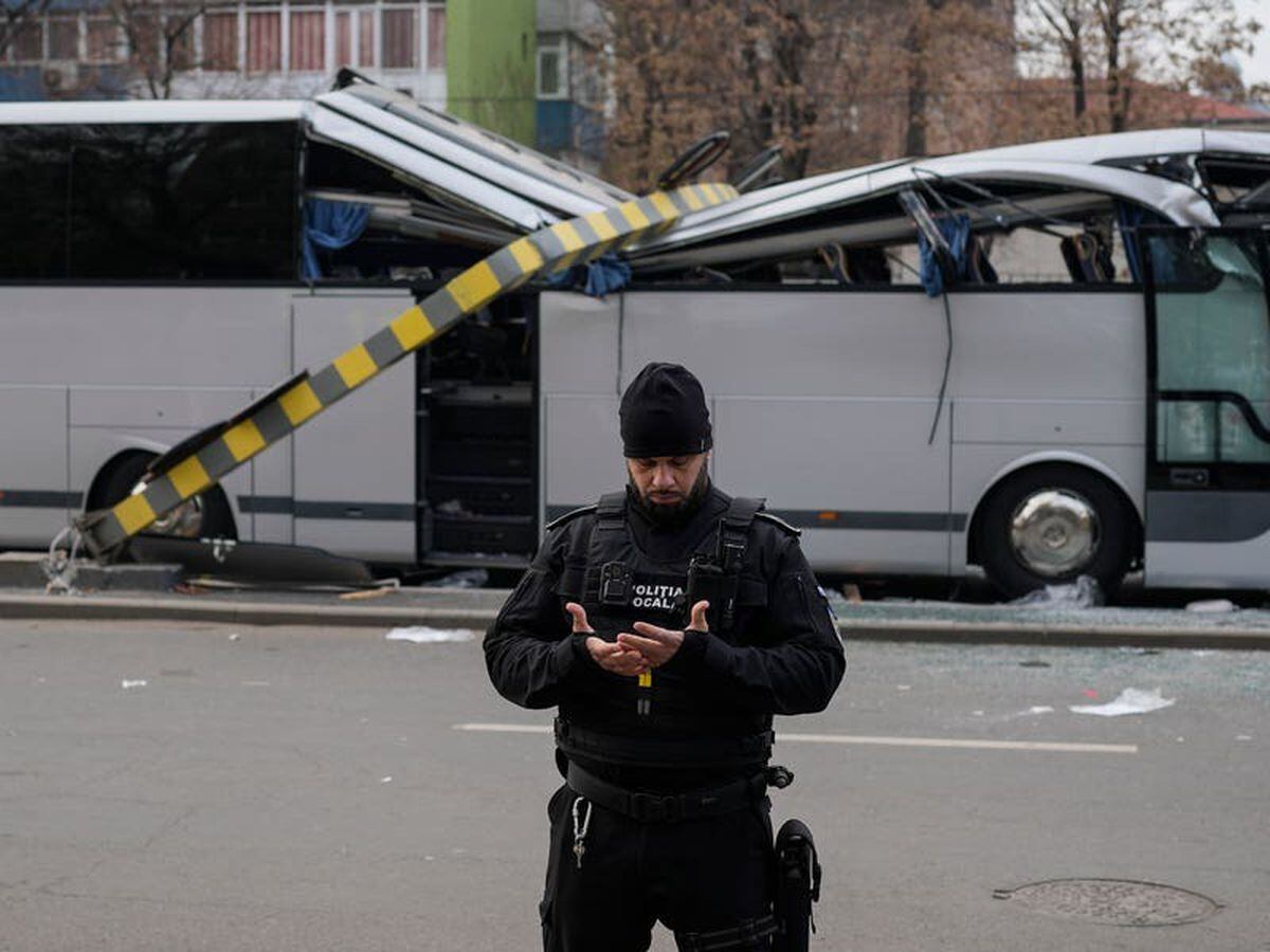 One dead and 22 hurt after coach crashes into height limit barrier in Romania