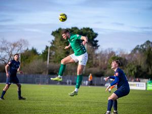 Sam Murray, pictured winning a header against Binfield at Footes Lane earlier this month, scored the winner against the same opposition in midweek for Guernsey FC. (Picture by Luke Le Prevost, 31794880)