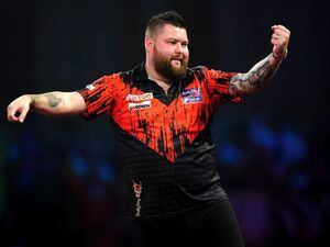 Gerwyn Price suffers second-round exit as Michael Smith makes progress