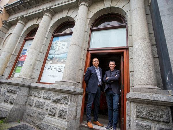 Creasey's director Jonathan Creasey, left, and general manager Stephen Mewha at the door of the former HSBC building which will be incorporated into a larger Creasey's High Street story. (Picture by Luke Le Prevost, 32260642)