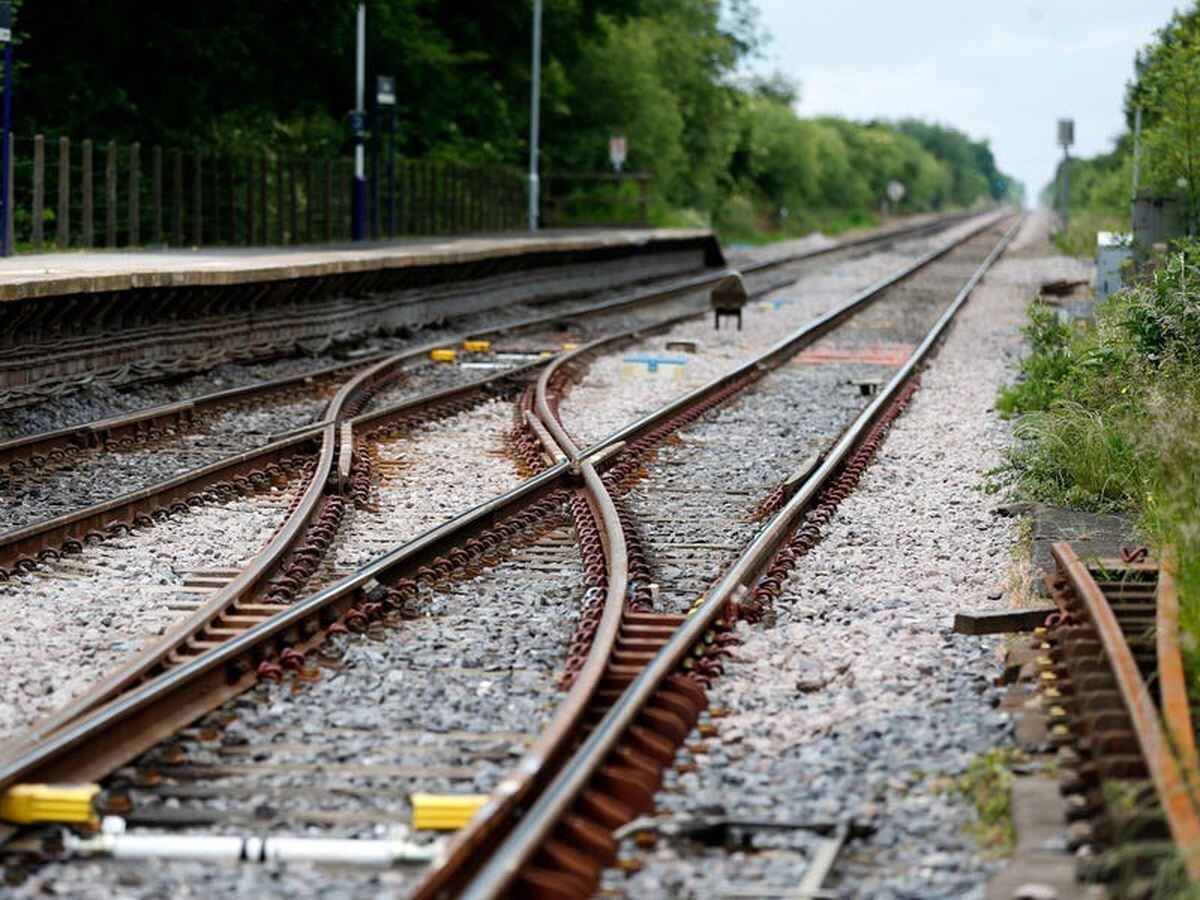 Fears of major disruption as railway workers vote overwhelmingly to strike