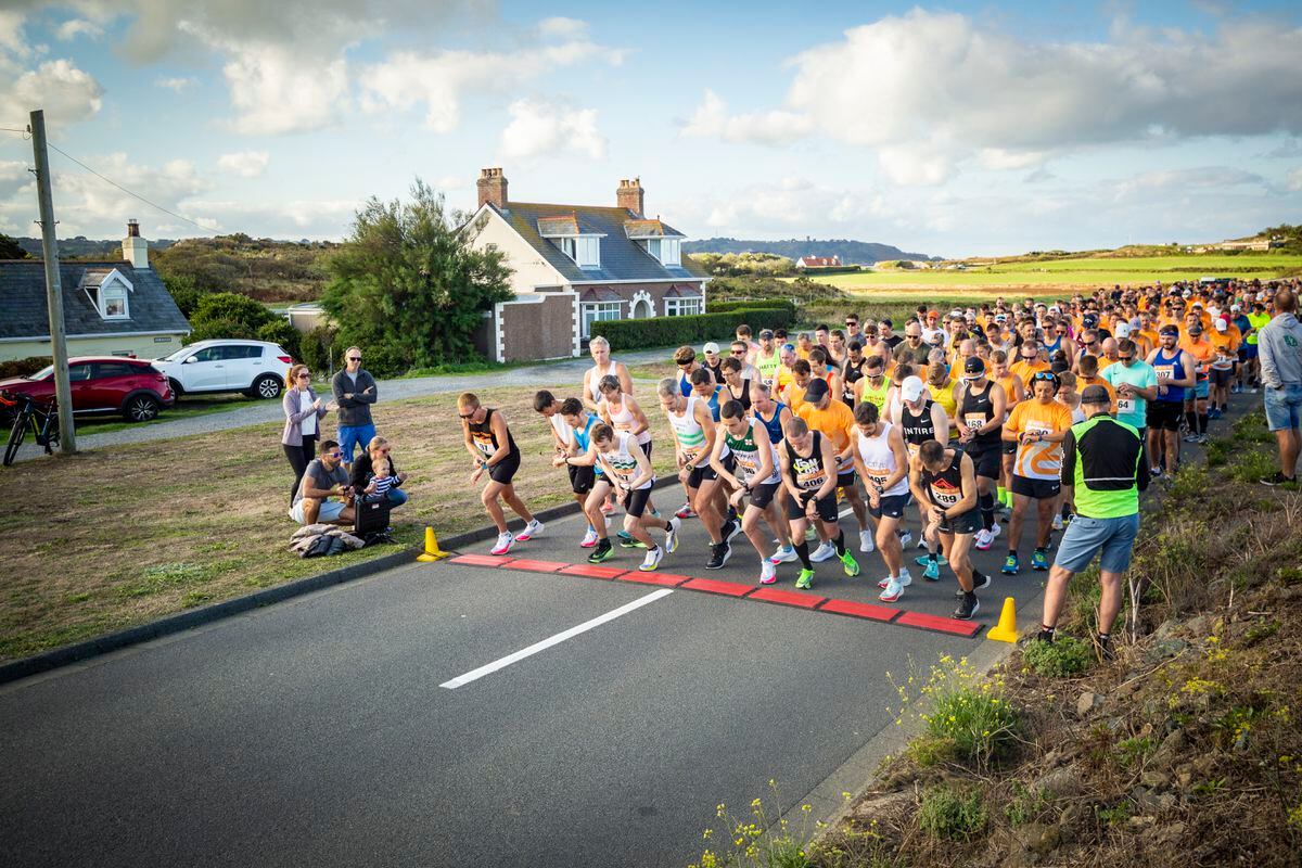 There were 525 entries for the 2022 Butterfield Half Marathon. Runners started next to the shingle bank at L’Eree and headed for Town around the coast. (Picture by Sophie Rabey, 31279416)