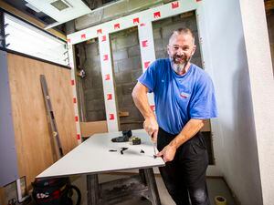 Andy Simon from Interior Systems working on the bathroom. (Pictures by Sophie Rabey, 32445941)
