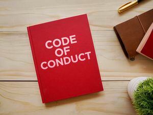 Top view of notebook with word Code of Conduct (29480026)