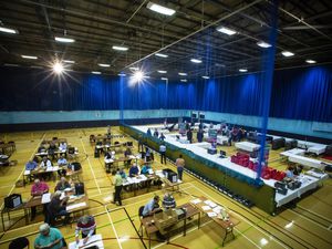 Volunteers at work counting the votes at Beau Sejour during the General Election. (28839653)