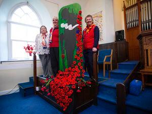 Picture By Peter Frankland. 09-11-21 United Reform Church, St Saviours. Local Trefoil Guilds have made a knitted poppy display..L-R - Sandra Sarre, Guernsey Guild, Kay Harvey, Sarnia Guild, Sue Veillard, Sarnia Guild.. (30180833)