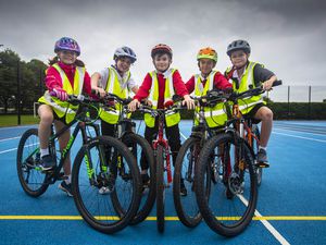 Ready for a Bikeability training session at Blanchelande College in preparation for Cycle To School Week are, left to right, Amity Horton, Vivienne Barclay, Euan Webb, Louie Lowe and Louis Hargreaves. (Picture by Peter Frankland, 31331260)