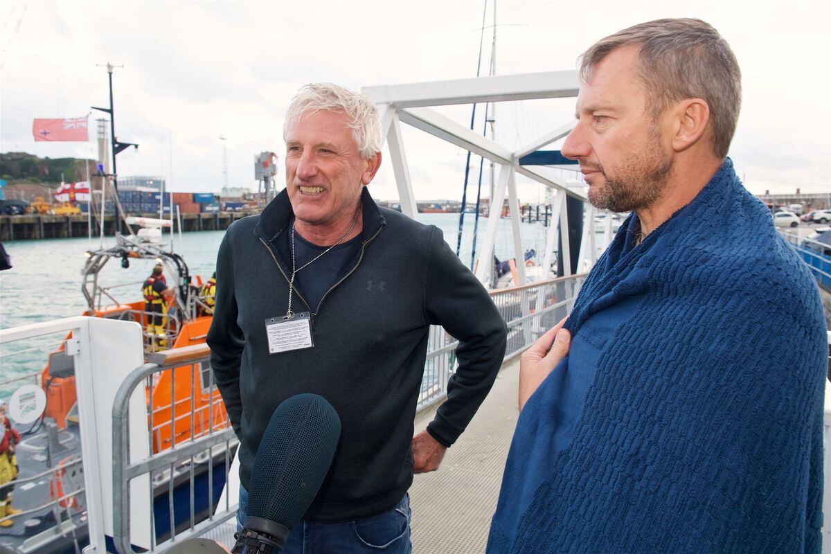 Robert Clifford, left, and Duncan Laisney talk to the media at St Helier Harbour after being rescued from a life raft by RNLI lifeboats after their light aircraft ditched in the sea off Jersey on Thursday. (Picture by Rob Currie, Jersey Evening Post)