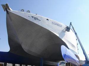 Condor Voyager having her new name put on in Cherbourg. (29475537)