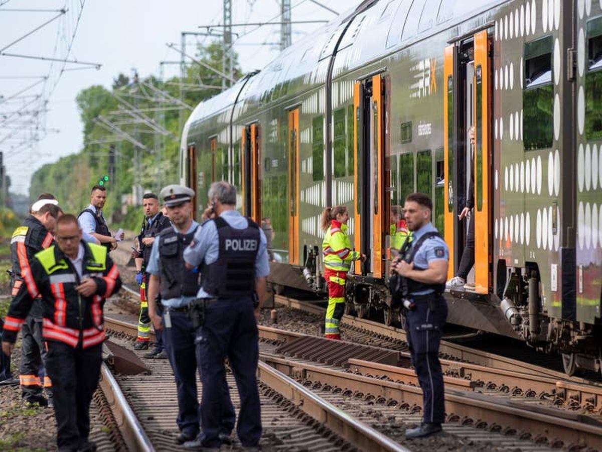 Passengers on German train overpower attacker who hurt five