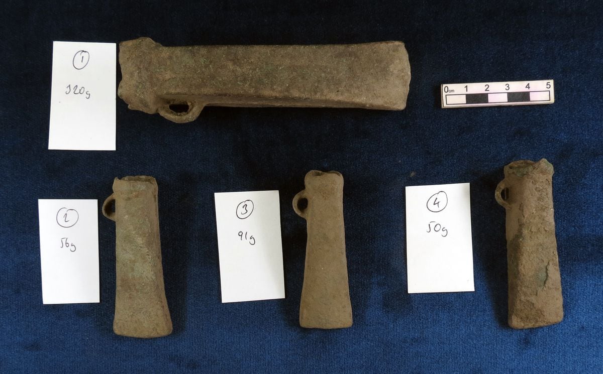The ceremonial socketed bronze axes, which were made in Brittany in 700 BC, were found by a licensed metal detectorist. (Picture supplied by Dr Phil de Jersey)
