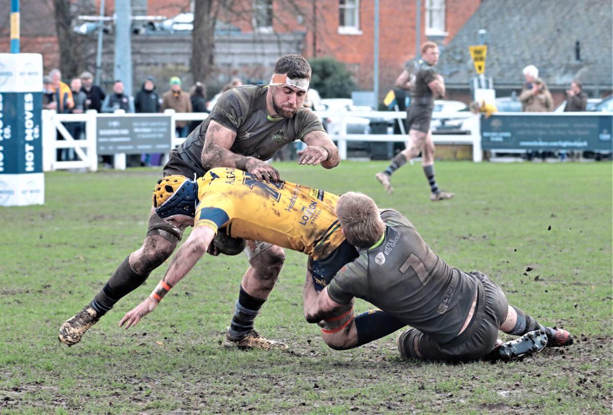 Brad Webb prepares to be the jackal as Oscar Baird makes the tackle. (Picture by Mike Marshall, 30519646)