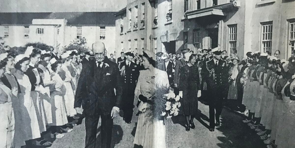 Princess Elizabeth serenely glides through the welcoming party outside the island's new hospital in 1949. (31252262)