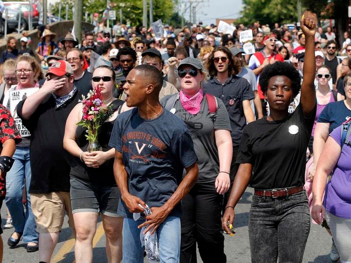 Vigil and marches mark anniversary of deadly far-right protest ...