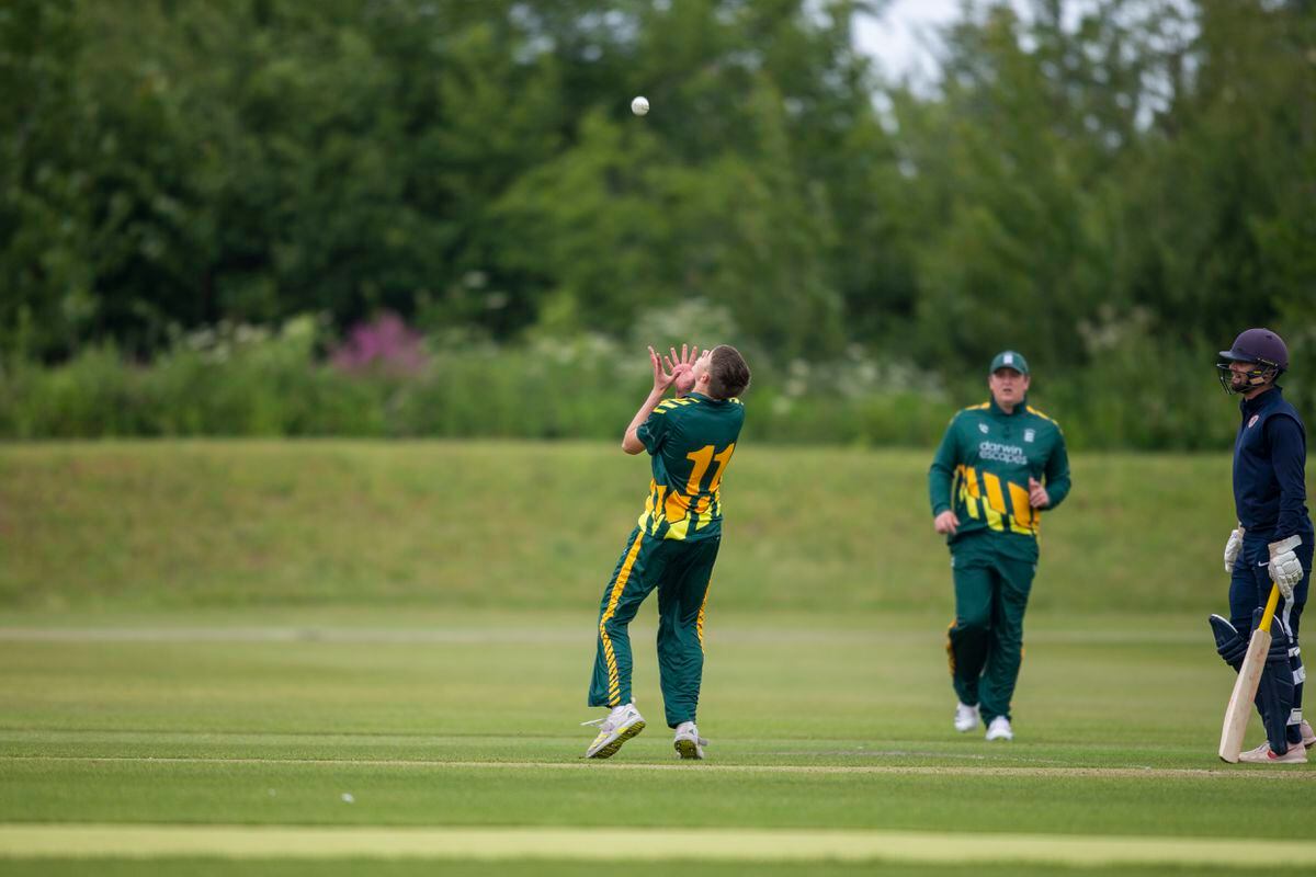 Charlie Forshaw sets himself to take a return catch in the first T20 game at the KGV on Wednesday. (Picture by Luke Le Prevost, 32168214)