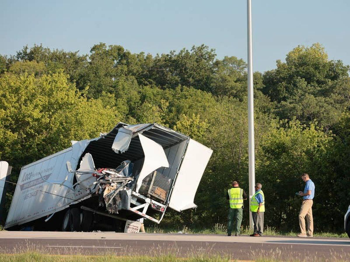 Three killed as Greyhound bus crashes into parked lorries in Illinois