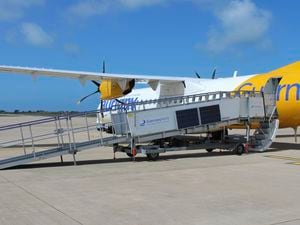 One of the two Aviramp Lite ramps purchased by Guernsey Ports positioned against the door of one of Aurigny’s ATRs.