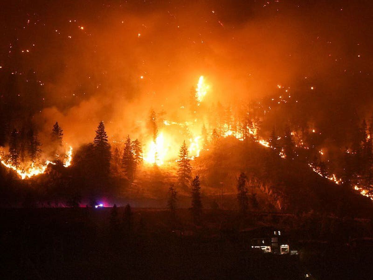 Canadian firefighters wage battle to save communities after mass evacuations