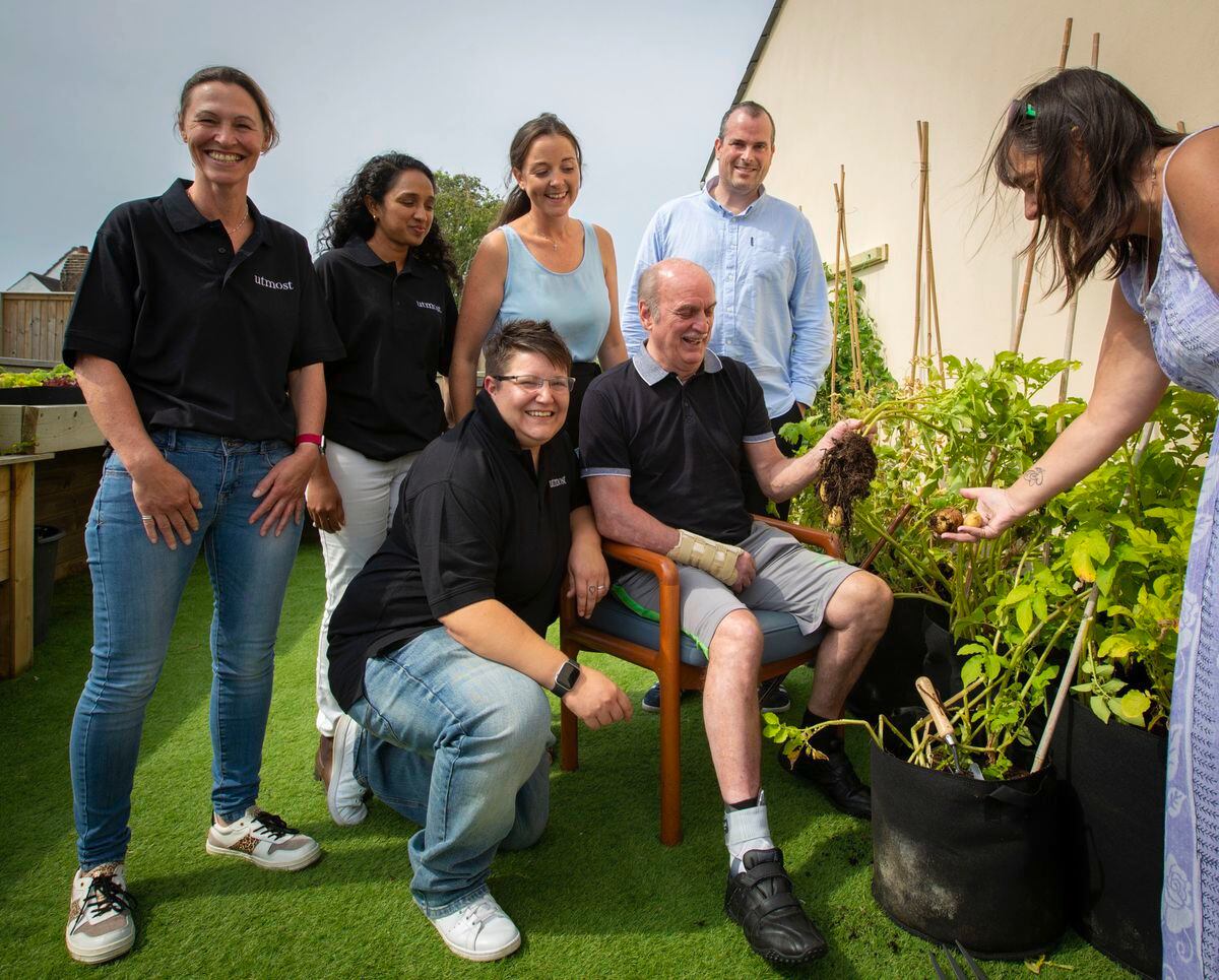 The opening of the Headway garden at the KGV. Left to right, Nicola Shakerley, Naga Nandiboyina, Holly Steele, Orla Manning, Steve Le Lerre, Tony Mealing, and Geraldine Williams. (Picture by Cassidy Jones, 29794207)