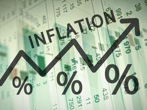 Word Inflation on up trend arrow, with financial data visible on the background.. (30434088)