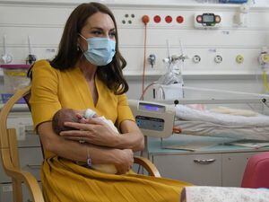 ‘She’s very sweet’: Kate cradles premature baby on visit to maternity unit